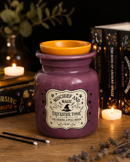 PRÉ-COMMANDE BRÛLEUR D'HUILE ET CHAUFFE-CIRE « MISCHIEF AND MAGIC » EN FORME DE FLACON DE POTION